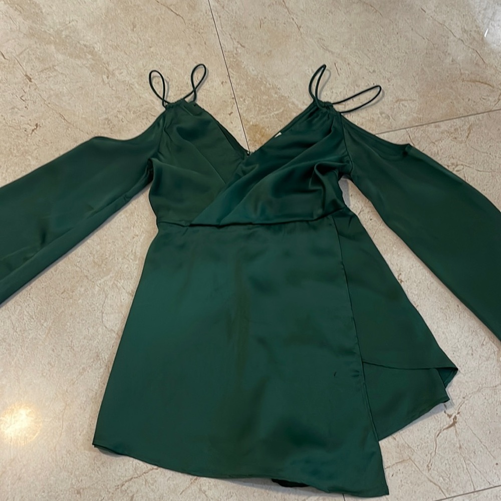 Beautiful, emerald green romper. Can be dressed up or down. Size small.